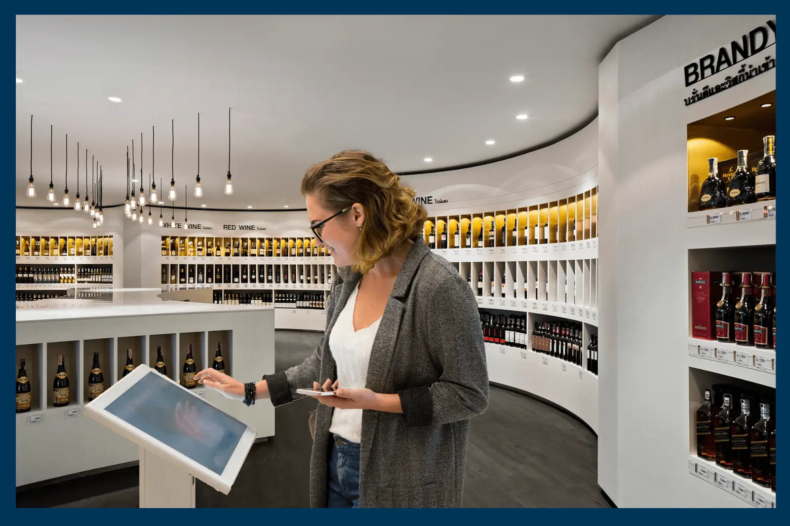 Person using Lightning POS system Kiosk in a wine store